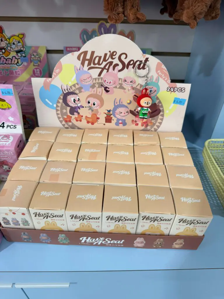 Boxes of the fake Labubu Have a Seat dolls inside nice boxes that look real for sale at a gift shop