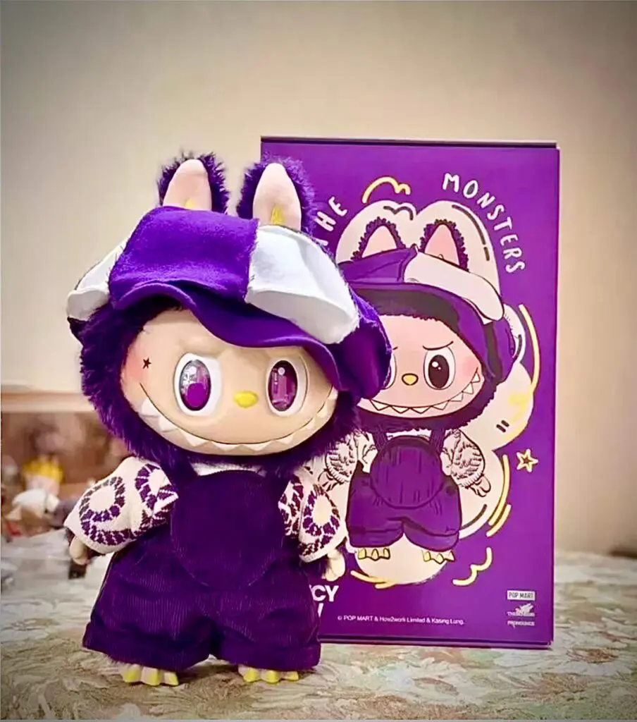 Labubu Be Fancy Now next to box on top of counter