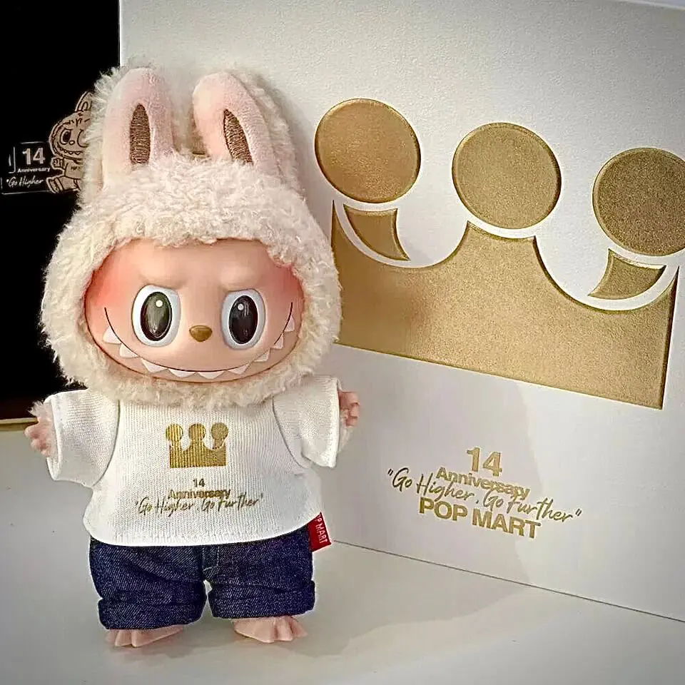 Labubu Pop Mart 14th anniversary doll standing next to box