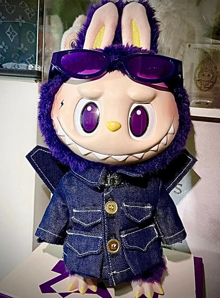 Labubu Wings of Fantasy standing on a stool