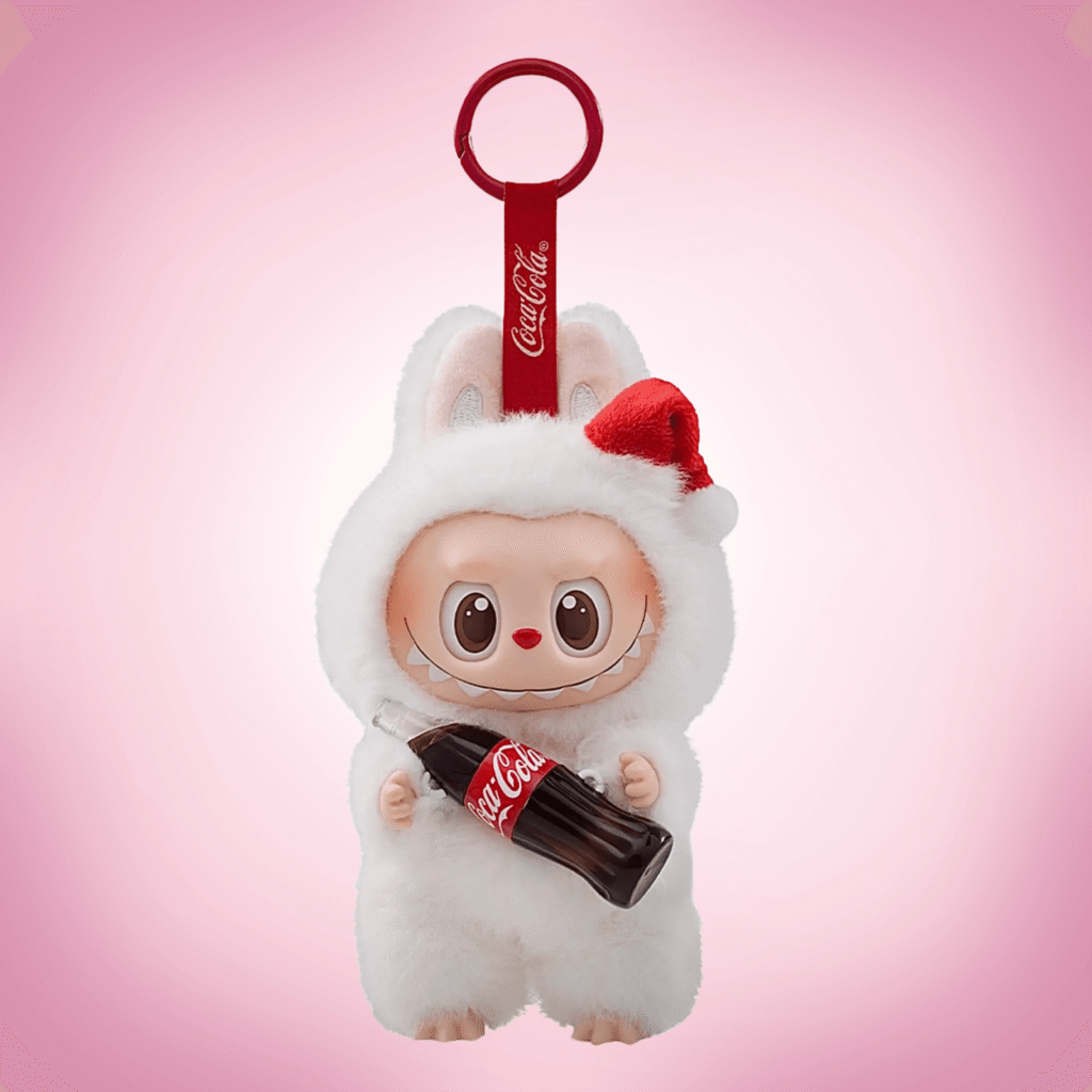 labubu coca cola surprise shake pink background