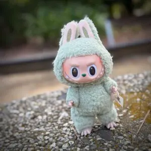 Labubu Green Grape from Exciting Macaron series standing on concrete outside