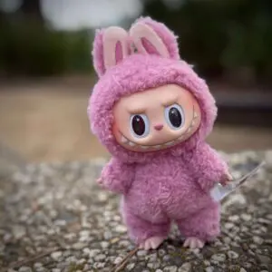 Labubu Lychee Berry standing outside on concrete