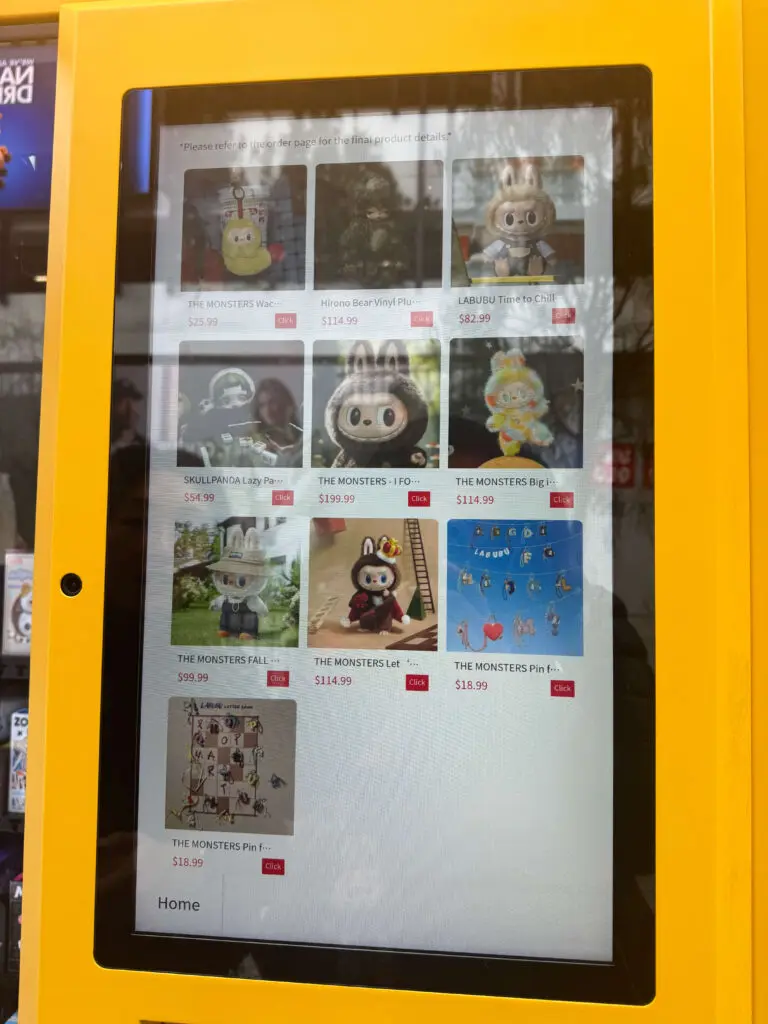 Closeup of screen of labubu vending machine (called a popmart roboshop) that was fully stocked with blind boxes and larger Labubu plush dolls