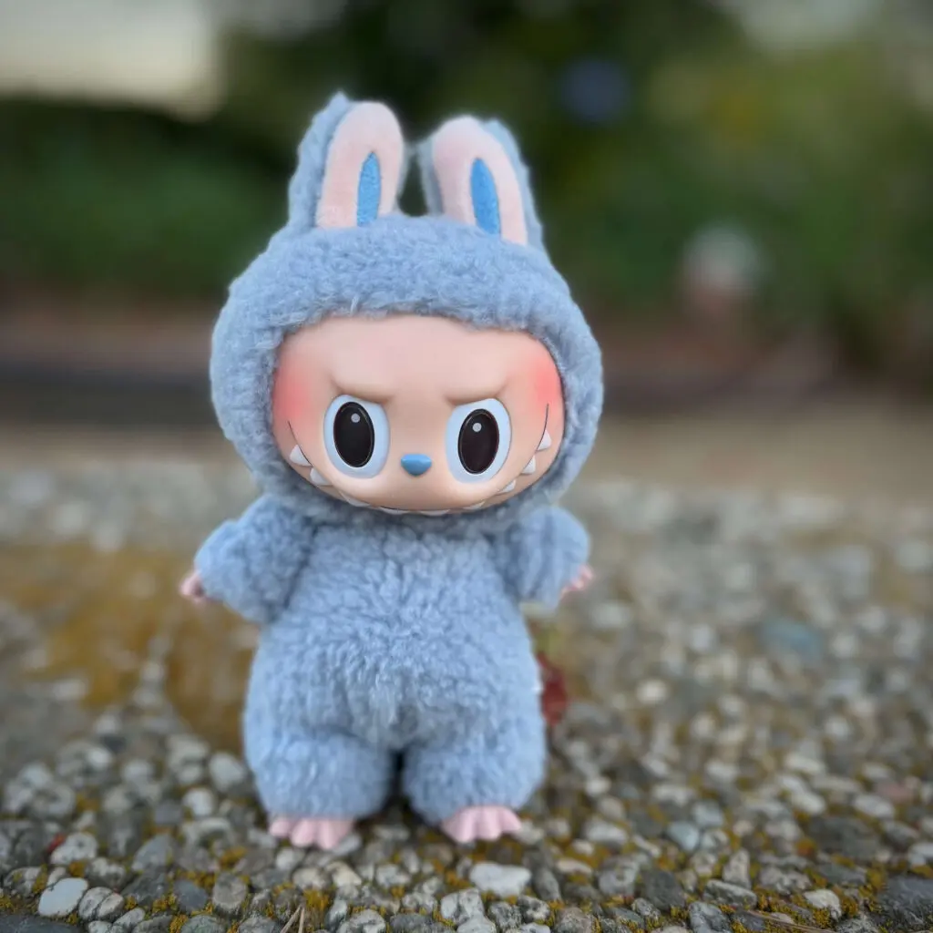 Labubu Sea Salt Coconut standing on concrete outdoors