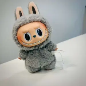 Labubu Sesame Bean on a gray background