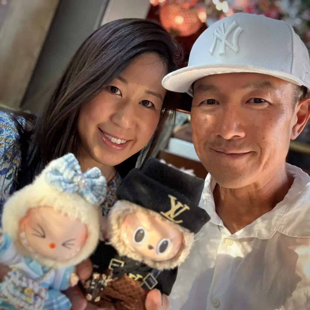 labubu sisi with labubu toffee at dinner in fancy clothes Simon Chan