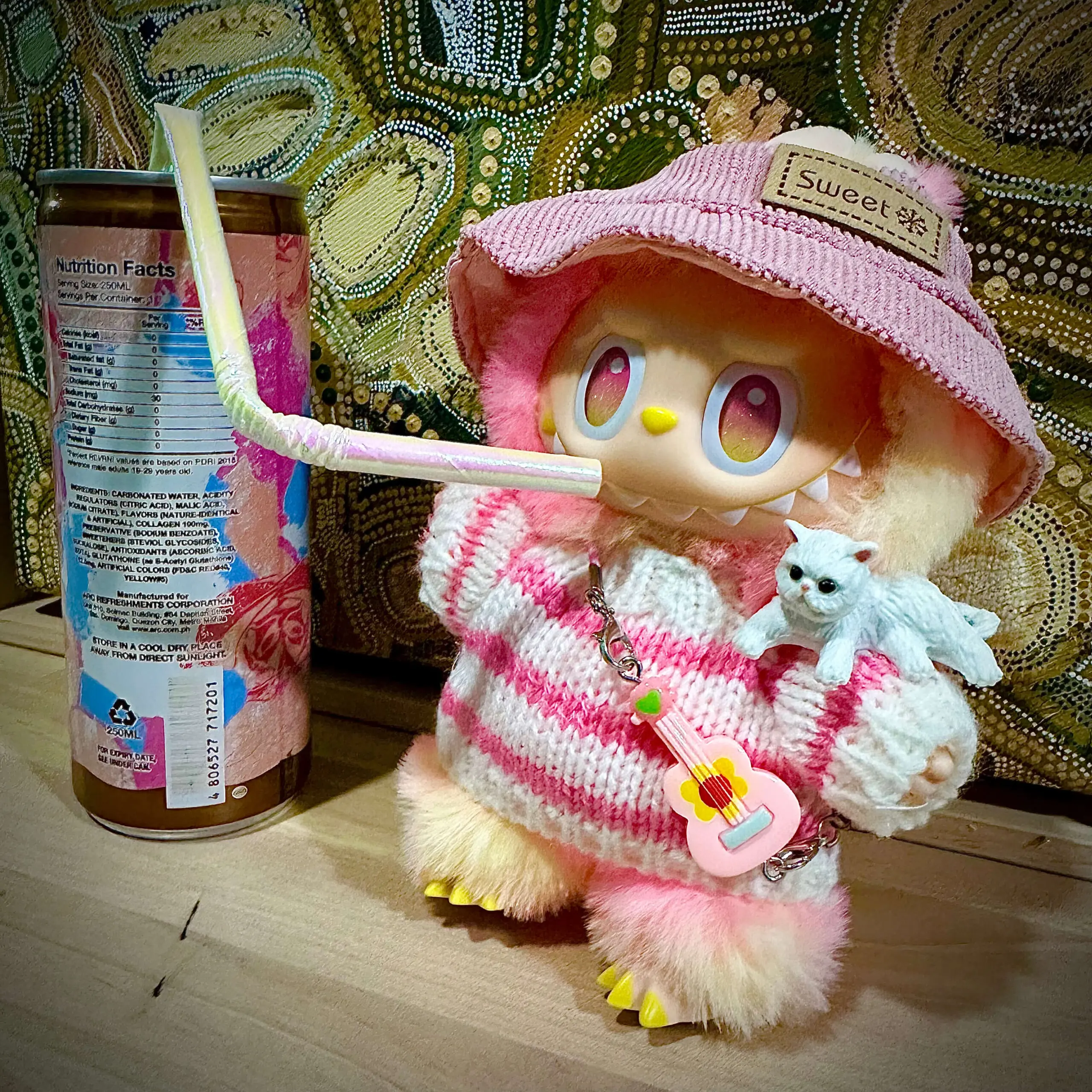 loyalty labubu clothes pink sweater drinking