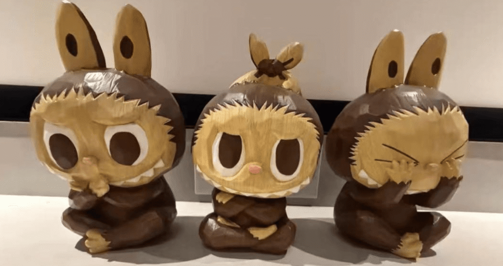 Three Wise Men Labubu figurine on display stand