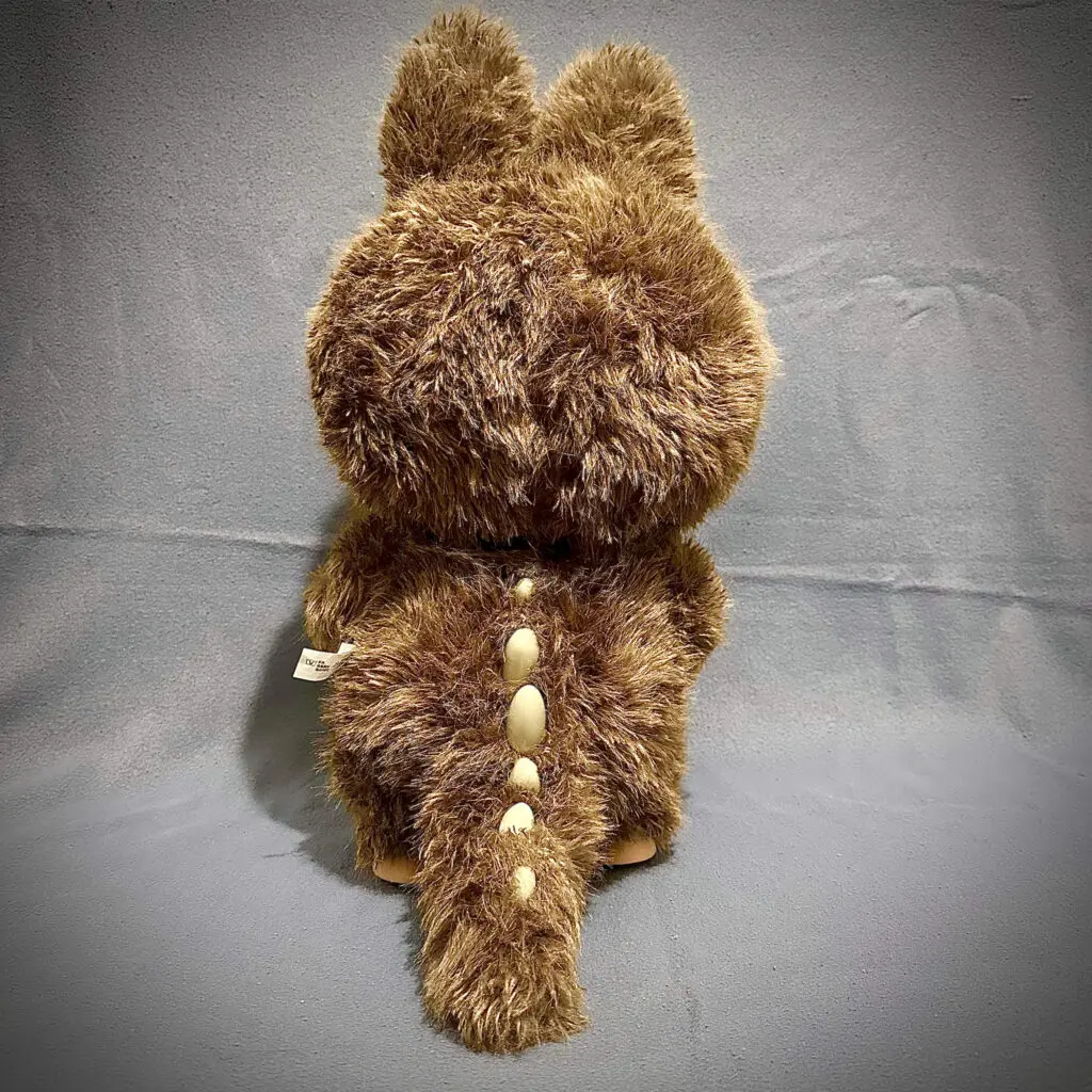 Back view of Zimomo I Found You showing his tail and spikes