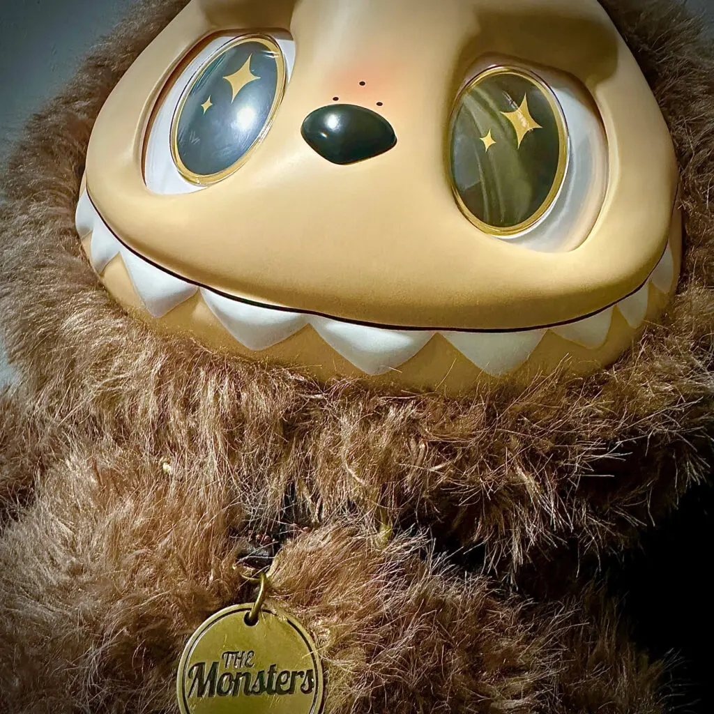 Close up of Zimomo Labubu teeth, necklace and face