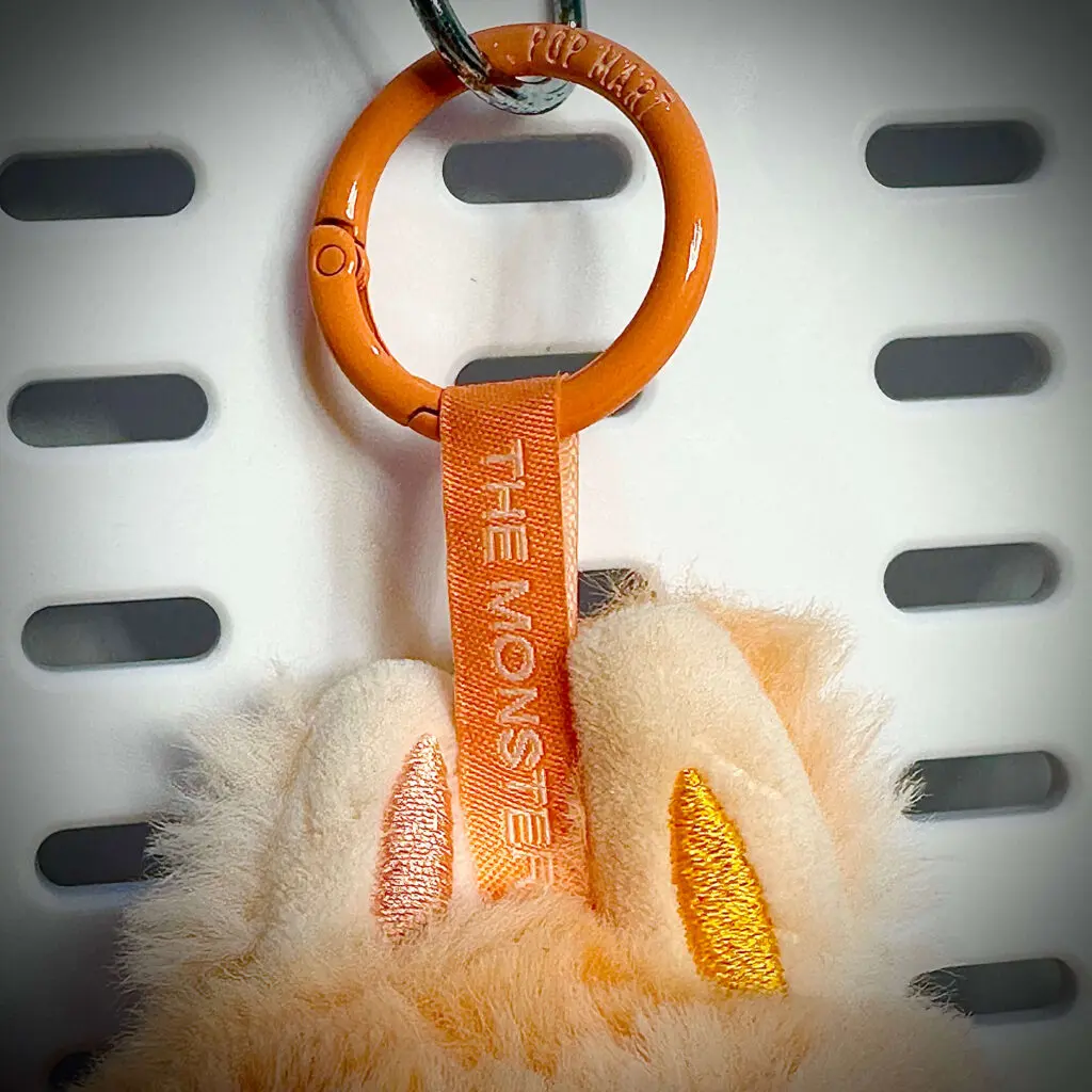 labubu big into energy happiness lanyard front