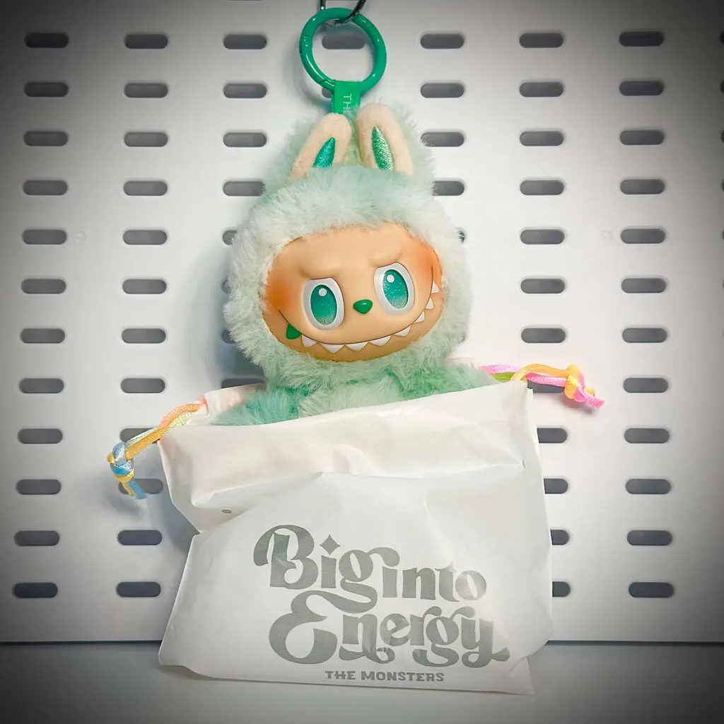 Labubu Serenity figurine inside its foil pouch packaging