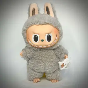 Labubu Sesame Bean close up in white background with spotlight