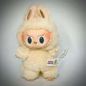 Labubu Soy Milk from Exciting Macaron standing under spotlight in white background with vignette