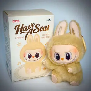 labubu have a seat baba beside box