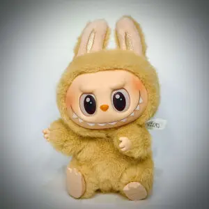 Labubu Baba from Have a Seat sitting and in spotlight in white background