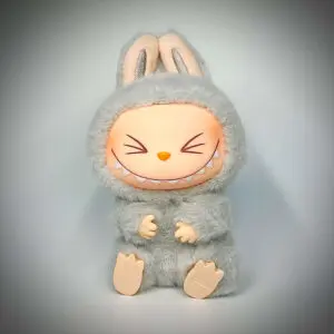 Labubu Hehe sitting with spotlight and white background