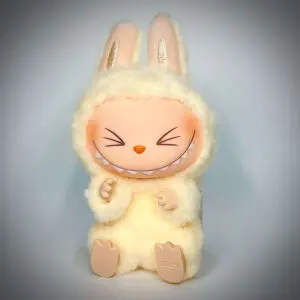 Labubu Sisi from Have a Seat sitting under spotlight in white background with vignette