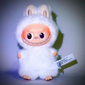 Labubu Pin for Love H Happiness in spotlight and white background with vignette