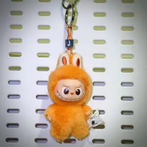 Labubu Pin for Love J Joy hanging on a board