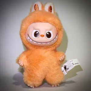 Labubu Pin for Love J Joy in spotlight in white background