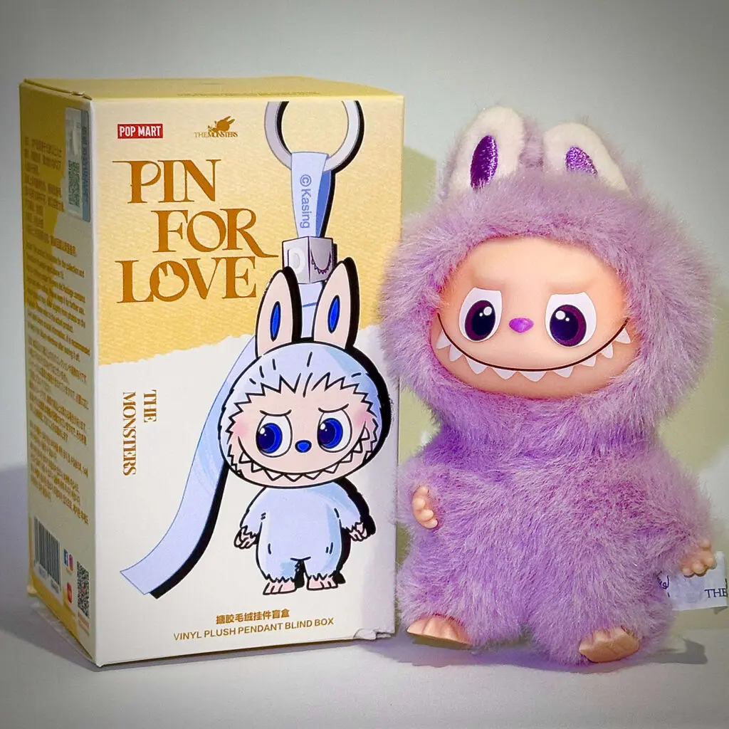 mini labubu pin for love M beside box