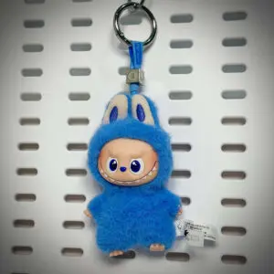 Labubu Pin for Love O Openness hanging on a board