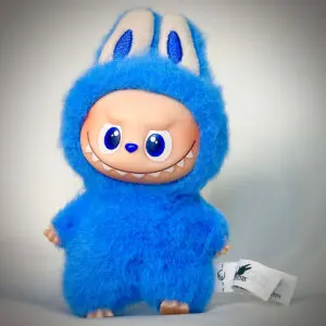 Labubu Pin for Love O Openness standing in spotlight in white background with vignette