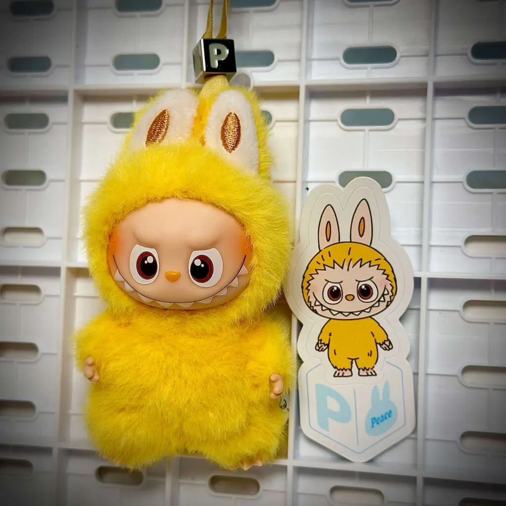 mini labubu pin for love p hung with sticker name