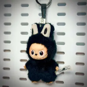 Labubu Pin for Love R Respect hanging on a board