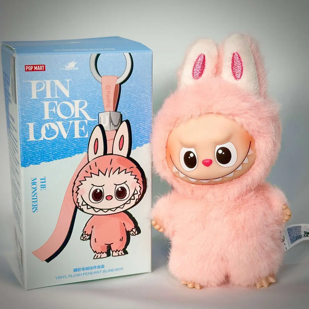 mini labubu pin for love u beside box