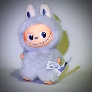 Labubu Pin for Love C Charming in spotlight and white background