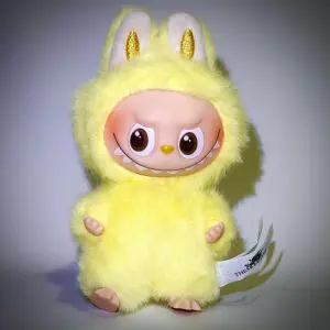 Labubu Pin for Love F Future in spotlight and white background with vignette