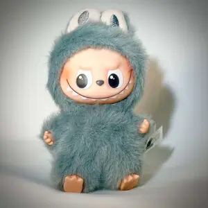 Labubu Pin for Love W Win in spotlight and white background