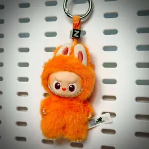 Labubu Pin for Love Z Zest hanging on a board