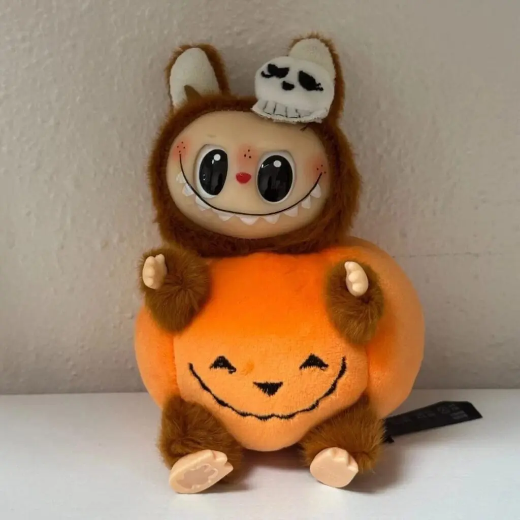 Fake Halloween Labubu Sitting on Pumpkin ugly