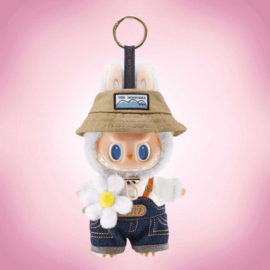 labubu fall in wild keychain white background pink background
