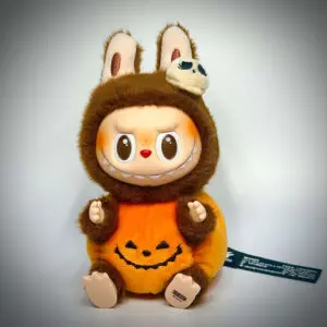 Labubu Halloween Sitting Pumpkin sitting in white background