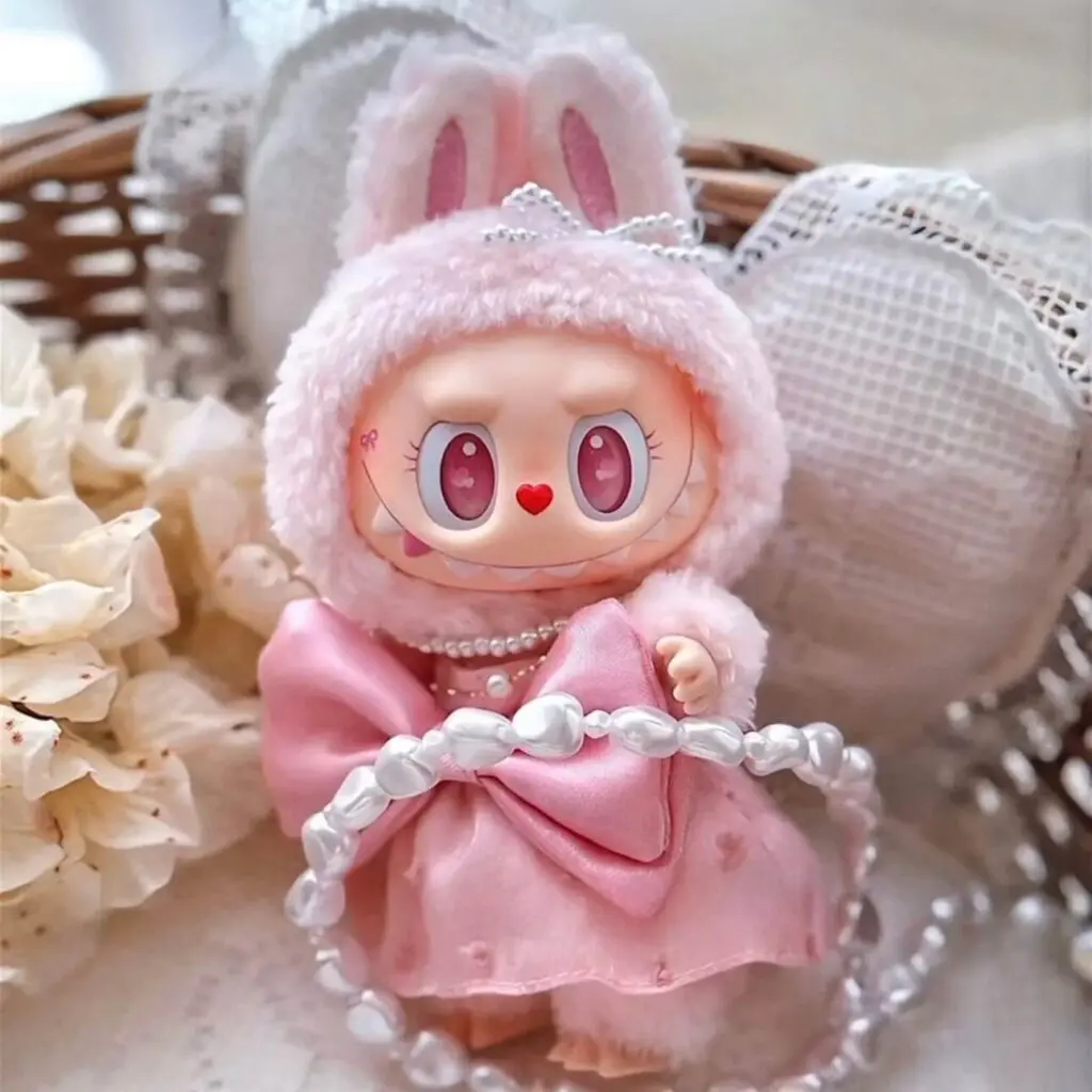 Labubu Mokoko Jump Into Summer inside a basket and on a small pillow