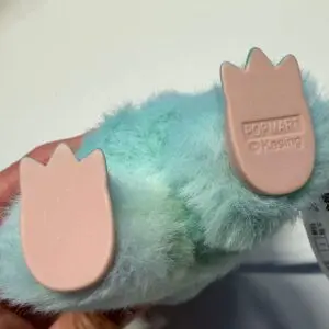 Closeup of the bottom of the feet of a real Labubu Serenity