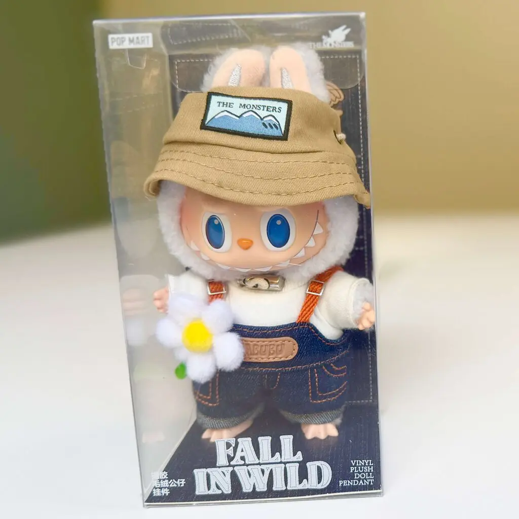 front view of Labubu Fall in Wild keychain doll unopened box packaging
