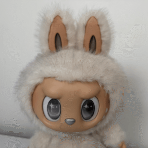 Close-up of Labubu Zimomo Angel In Clouds plush doll showing face detail