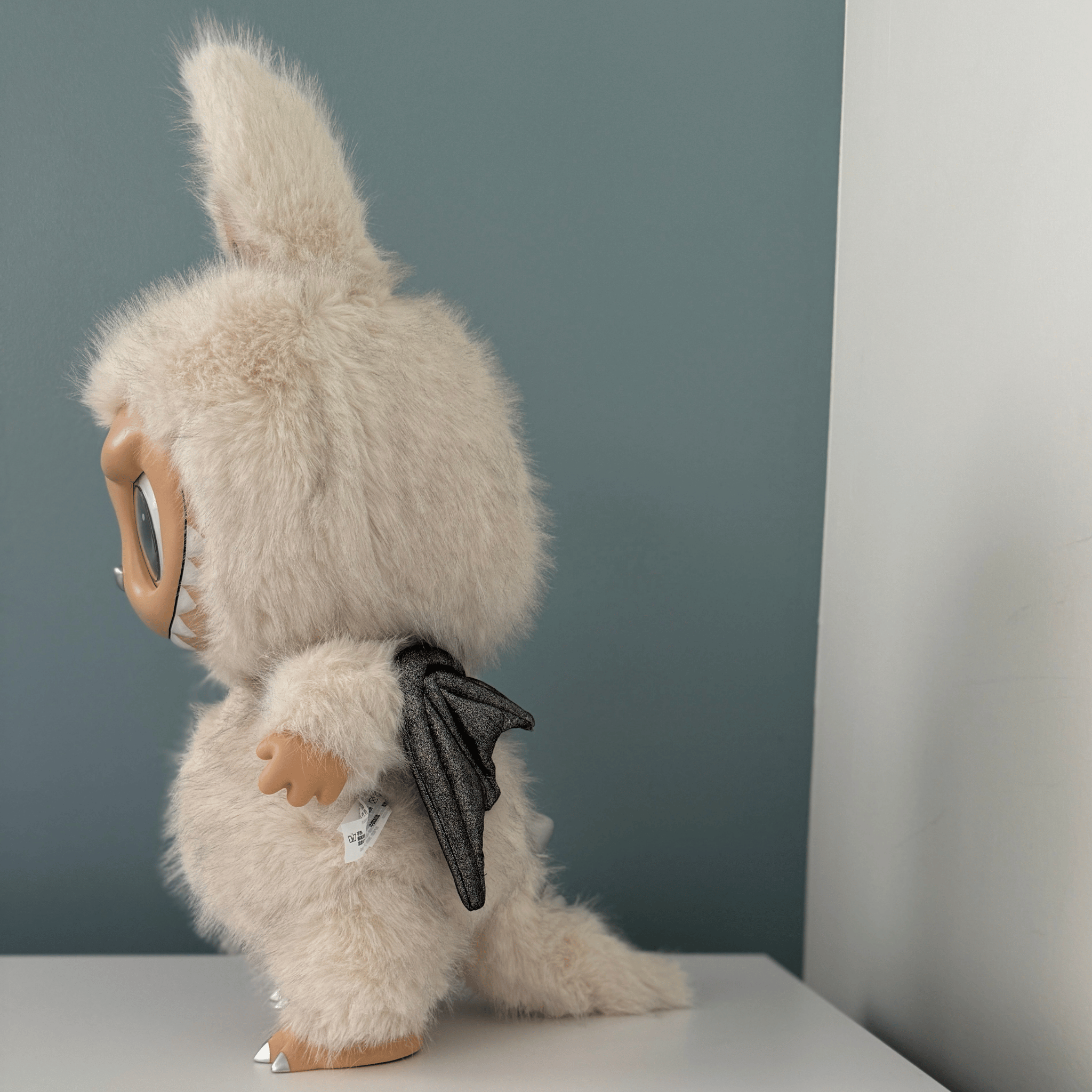 side view of Labubu Zimomo Angel In Clouds plush doll