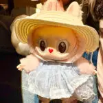 Mokoko Blue Diamond keychain doll attached to a bag