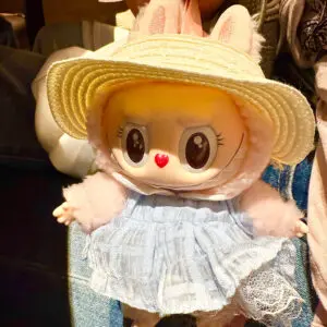 Mokoko Blue Diamond keychain doll attached to a bag