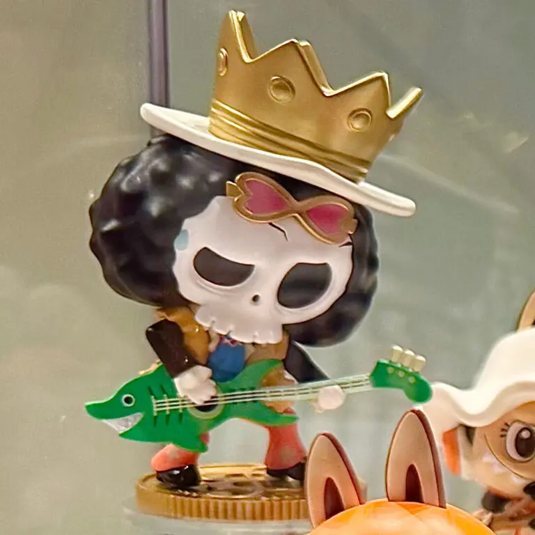 Labubu boyfriend Tycoco Brook from The Monsters x One Piece series inside a glass store display