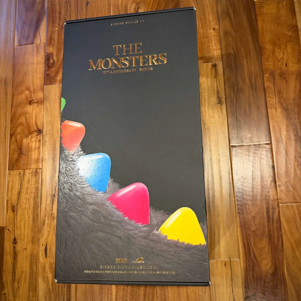 labubu zimomo 10th anniversary box showing front cover that has different color spikes
