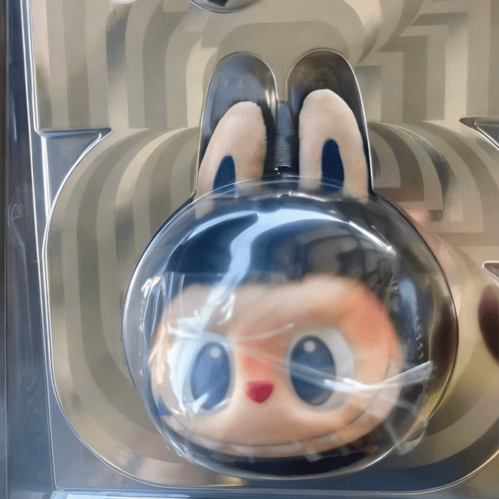 Labubu x Fifa World Cup Catch The Win plush pendant inside its original box packaging