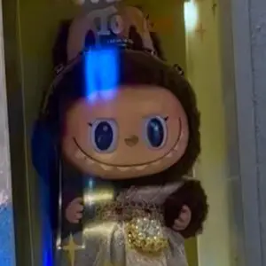 Labubu Good Luck To You Thailand-exclusive keychain doll on a store display inside box